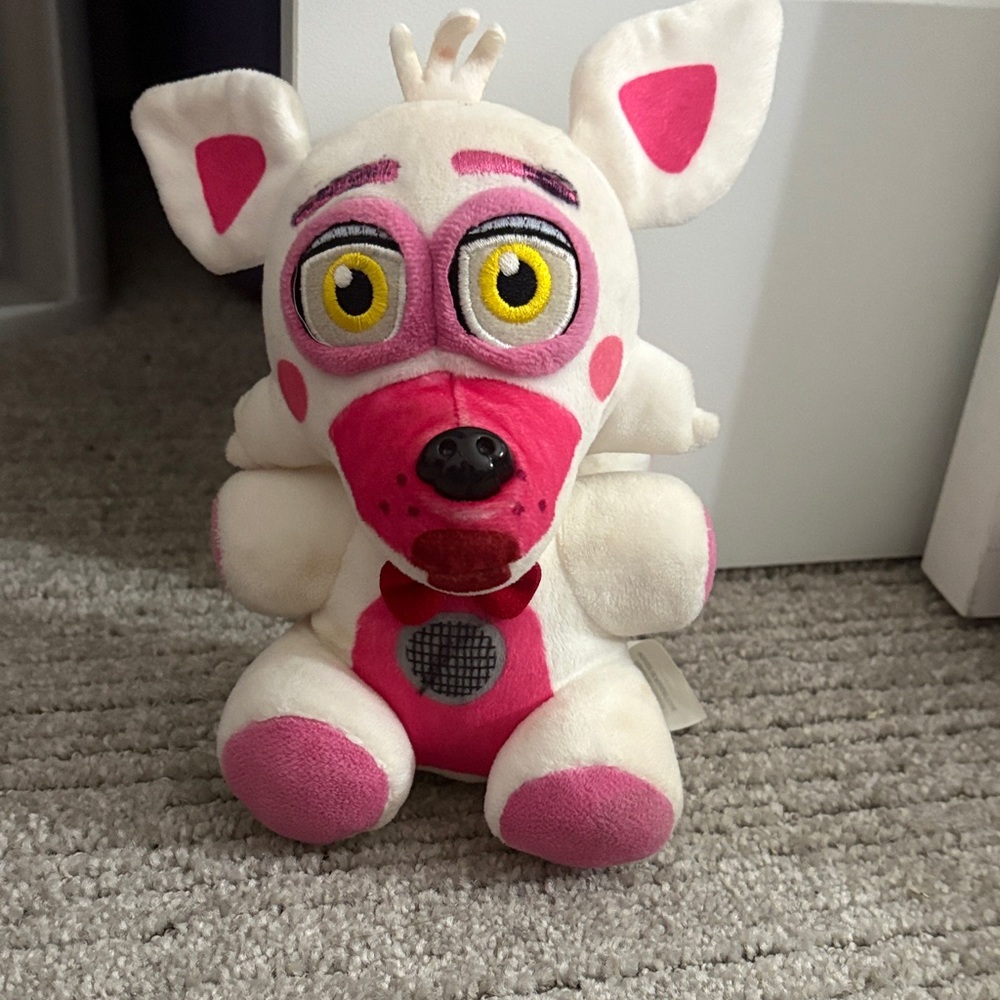Pink and White Stuffed Animal Toy